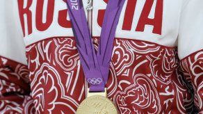 Una mermada selección olímpica de Rusia vuela a Rio