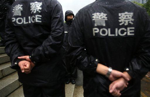 Juzgan a cuatro mandos policiales por escándalo en China