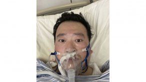 China exonera a médico reprendido por advertir sobre virus