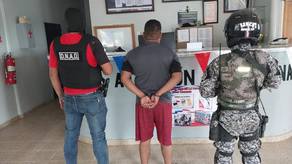 Policia Nacional, una de las personas detenida en Operación Omega Policia Nacional, una de las personas detenida en Operación Omega