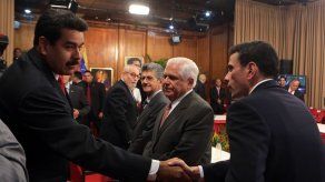 Maduro y Capriles coinciden en jornada electoral en que llegó el día
