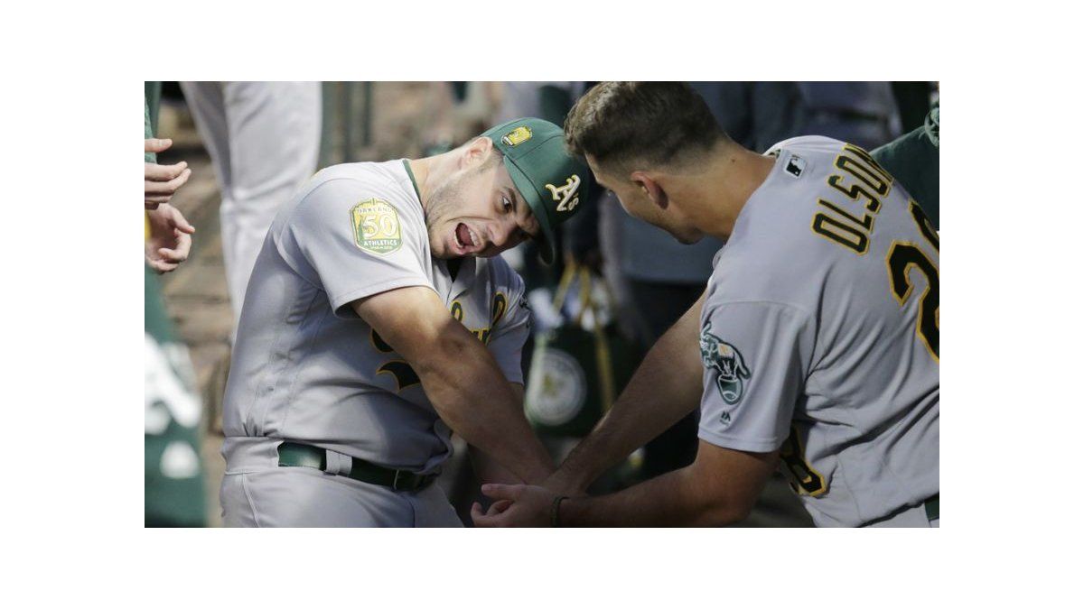 Atléticos avanzan a playoffs, antes de vencer a Marineros