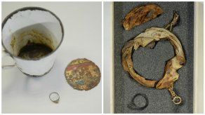 Hallan anillo y cadena de oro ocultas en taza en Auschwitz