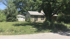 Hallan cadáver en garaje de casa abandonada en Illinois