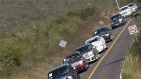 Mexicanos emigrados regresan para desfile de camionetas