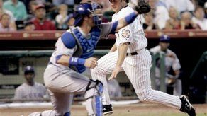 Berkman guía a los Astros que superan a los Rangers