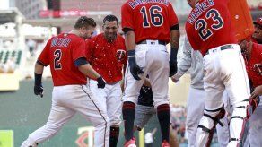 Dozier da grand slam en la décima y Mellizos vence 11-7 a Rays
