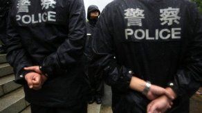 Juzgan a cuatro mandos policiales por escándalo en China