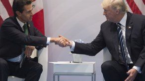 Trump y Peña Nieto buscan acordar un encuentro