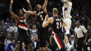 Clippers vencen a Blazers con tiro de Redick