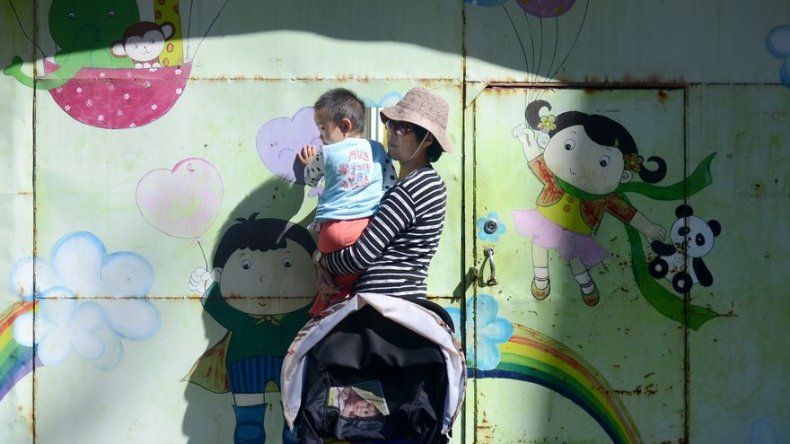 Permitir segundo hijo en China no generará explosión demográfica