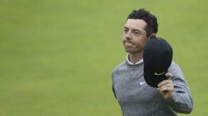 Lowry y Holmes comparten la cima en Abierto Británico