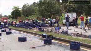 Rebatiña de cervezas en Cativá