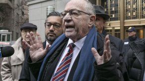 AP - ERIC TUCKER y ZEKE MILLER