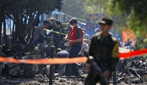 En EU analizan cajas negras de avión caído en México