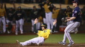 Atléticos acortan distancia a playoffs al vencer a Mellizos