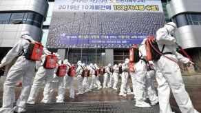 KEN MORITSUGU y LORI HINNANT