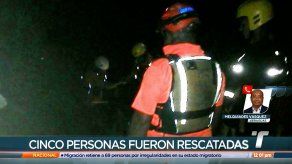 Rescatan a cinco personas y el cuerpo de una víctima fatal  tras crecida de río en Santiago