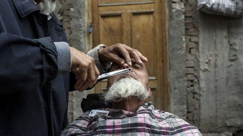 China prohíbe llevar barba o velo en Xinjiang para frenar el extremismo