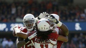 Palmer pasa para 4 TDs y Cardinals aplasta a Bears