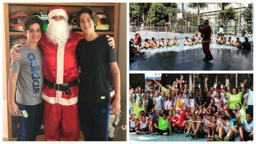 Expiloto de Fórmula Uno reparte regalos vestido de Noel en zona roja de Sao Paulo
