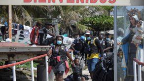 Las autoridades de Panamá lidian con la creciente llegada a través de la peligrosa selva del Darién, la frontera con Colombia, de migrantes, especialmente haitianos, que viajan hacia EE. UU.
