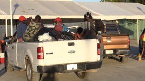 Migrantes haitianos retiran campamentos en frontera de EE. UU. y México
