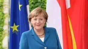 Sondeo: Merkel tiene los pies en la tierra y no es muy femenina