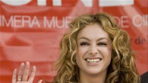 Paulina Rubio y  Marc Anthony cantan por Obama