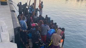 Migrantes haitianos evacuados.