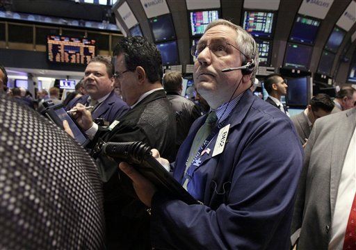 Wall Street cierra a la baja por reporte pesimista de la Fed