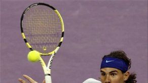 Nadal gana en dobles en Doha