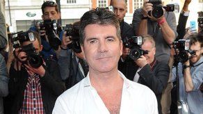 Simon Cowell da consejos sobre paternidad a Louis Tomlinson
