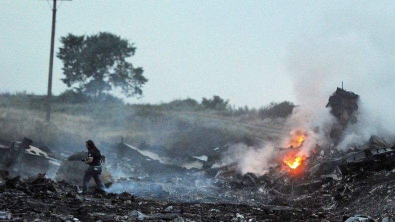 Un total de 65 víctimas de avión malasio derribado en Ucrania fueron identificadas