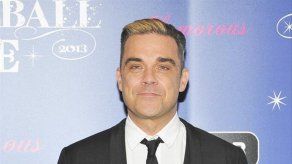 Subastan en Londres trajes y manuscritos de las canciones de Robbie Williams