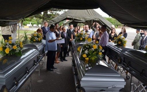 Repatrian cuerpos de 11 migrantes hondureños masacrados en México