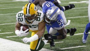 Packers vencen a Lions; se coronan en la División Norte