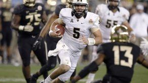 Bears caen ante UCF 52-42 en Fiesta Bowl
