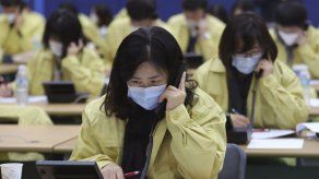 KEN MORITSUGU y MATT SEDENSKY