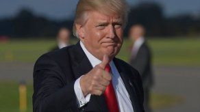 May dice que Trump sigue aún invitado a Reino Unido a pesar de tropiezos diplomáticos