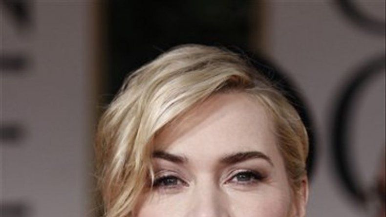 Kate Winslet, Kenneth Branagh condecorados por reina Isabel
