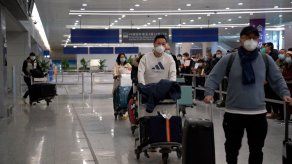 China levanta cuarentenas a viajeros internacionales y pone fin a tres años de aislamiento