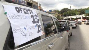 El dólar se abre paso en medio del duro y caótico ajuste de Maduro