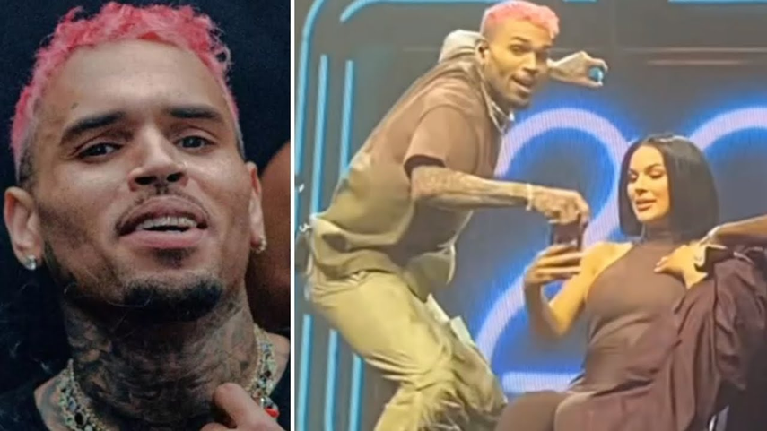 Chris Brown le estrella celular a fanática en pleno escenario