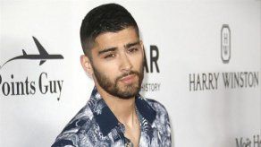 Zayn Malik se escondió entre sábanas sucias para escapar de sus fans
