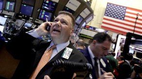 Wall Street sube por expectativa de estímulos de la Fed