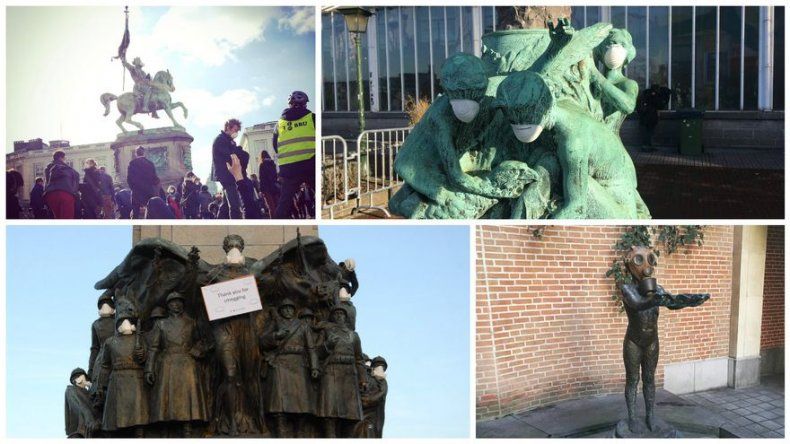 Unas 200 personas cubren con máscaras estatuas en Bruselas por un aire limpio