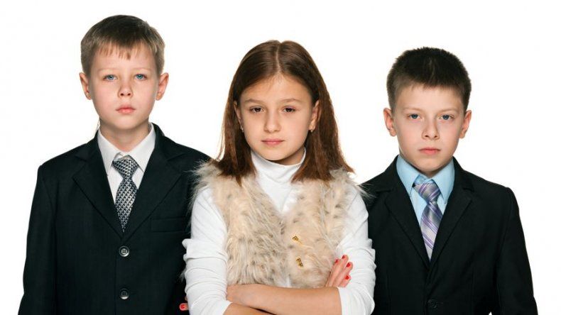 Niños que no sonríen en fotos tienen más posibilidades de divorciarse de adultos