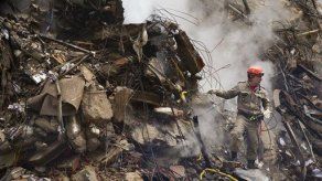 Hallan más cadáveres entre escombros en Río