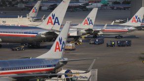 AMR saldrá de la quiebra y se fusionará con US Airways el 9 de diciembre (comunicado conjunto)